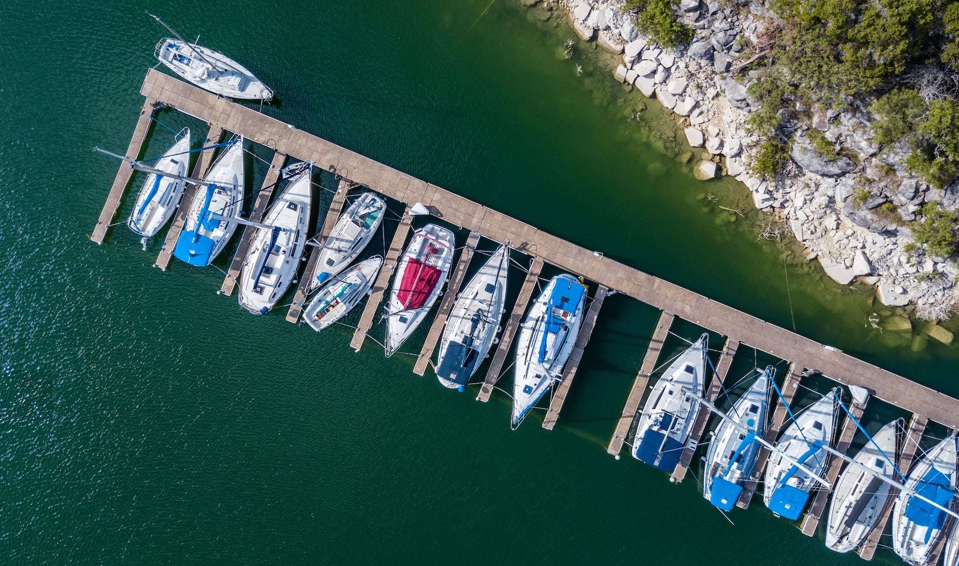 Overhead areal shot of boats in Lake Travis. Lakeway, Texas.
